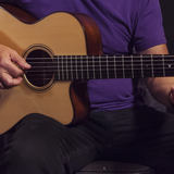 This image shows a LCT 140 small diaphragm condenser microphone on a Martin acoustic guitar